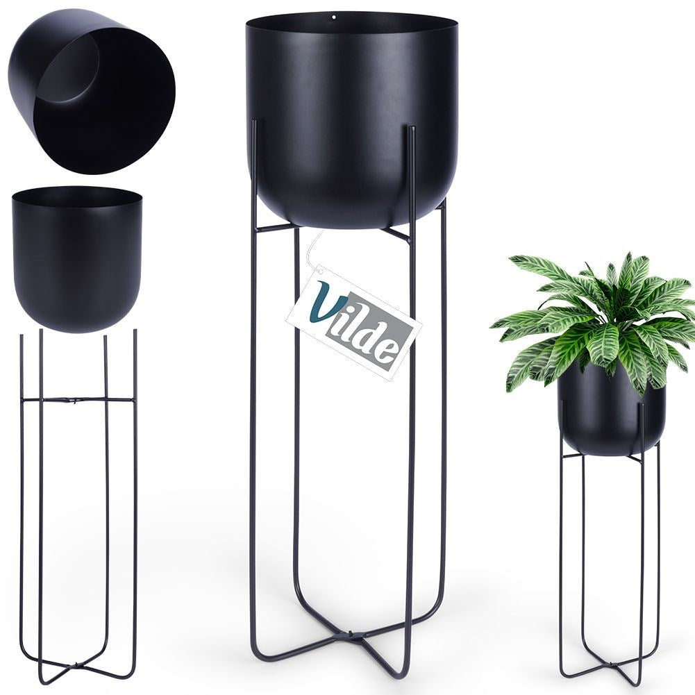 Black metal pot on stand for modern interiors