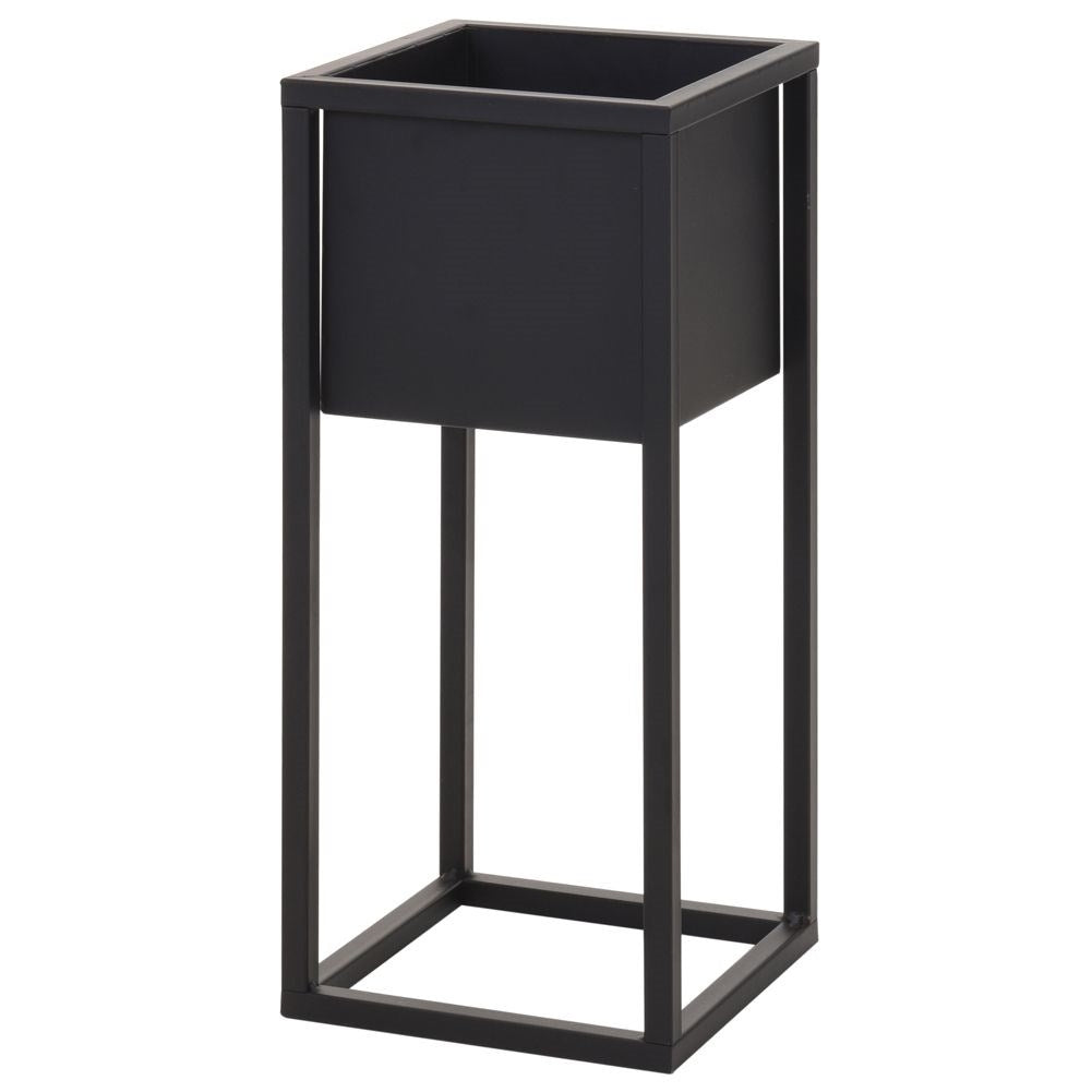 Black metal pot on stand in industrial style