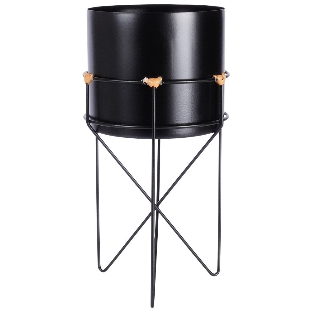 Black metal pot with stand for stylish plant display