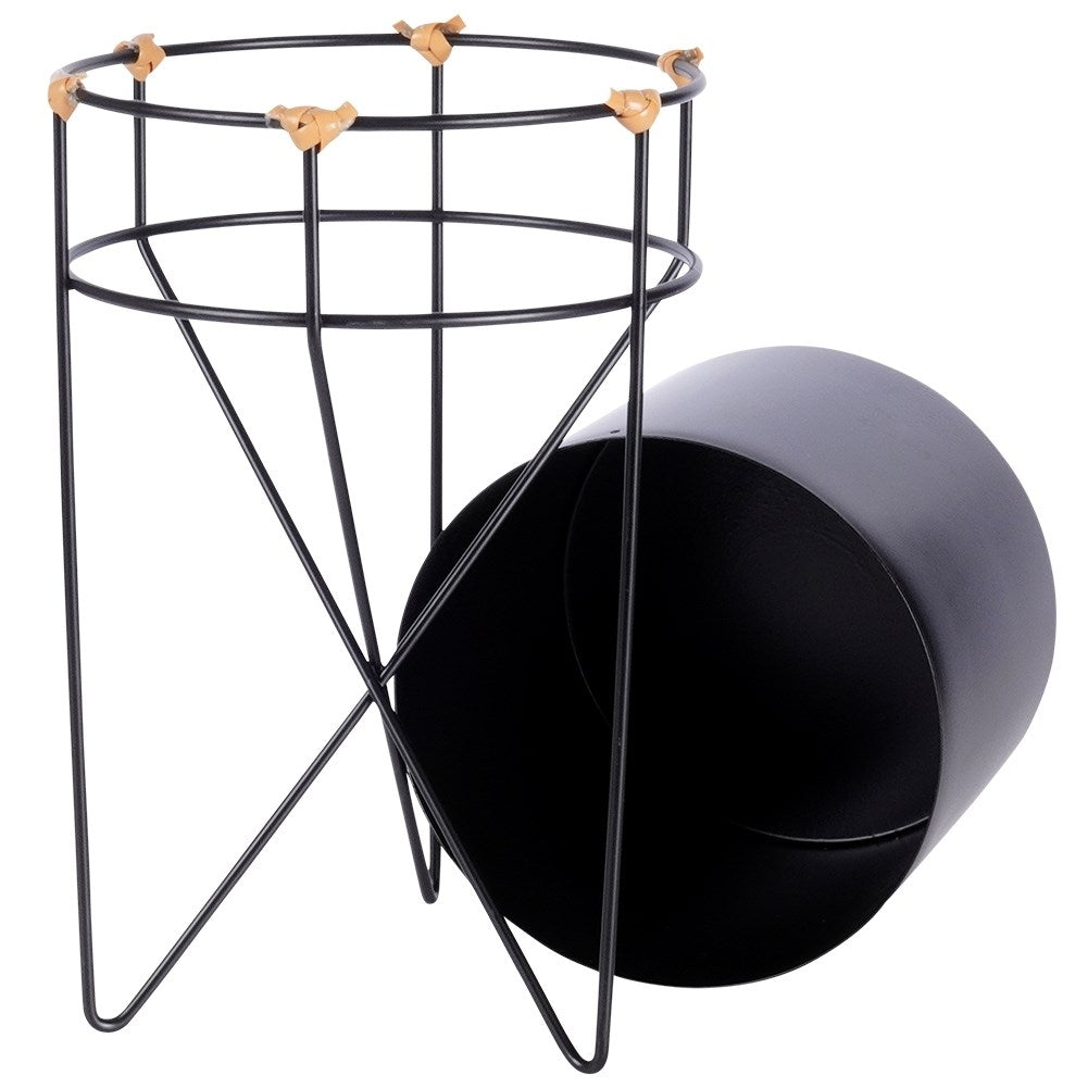 Black metal pot with stand for stylish plant display