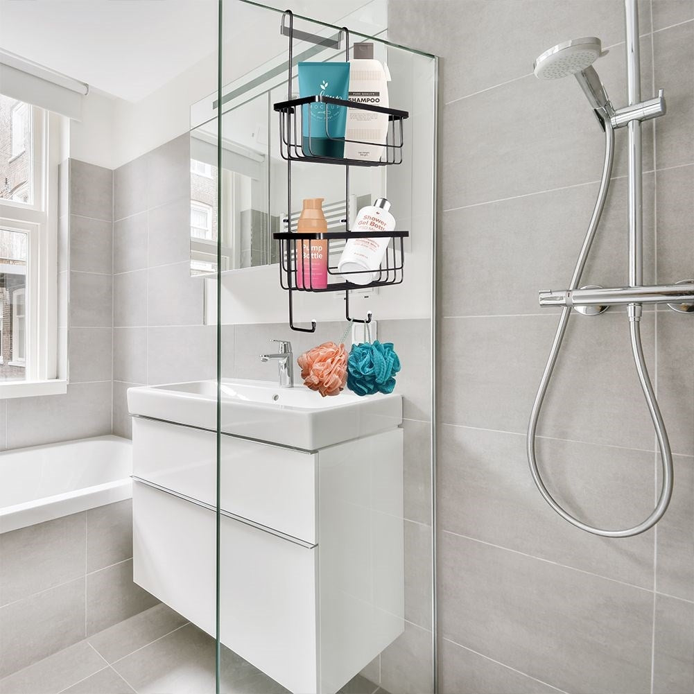 Black metal shelf for bathroom, hangs on shower wall