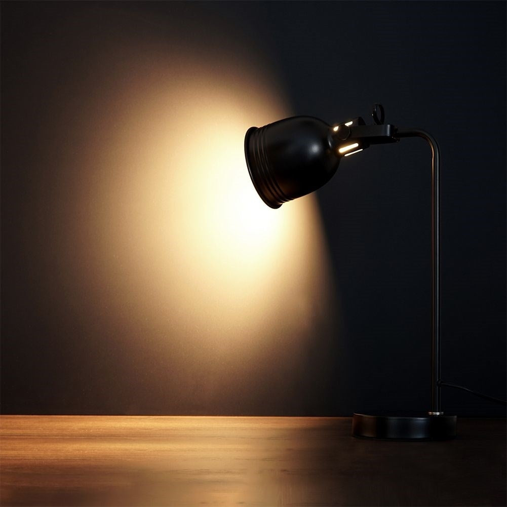 Black metal table lamp with adjustable white lampshade