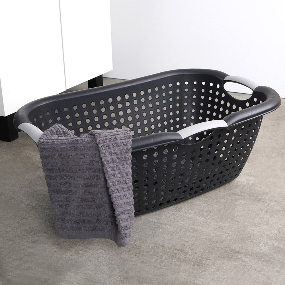 Black perforated laundry basket in light and durable plastic