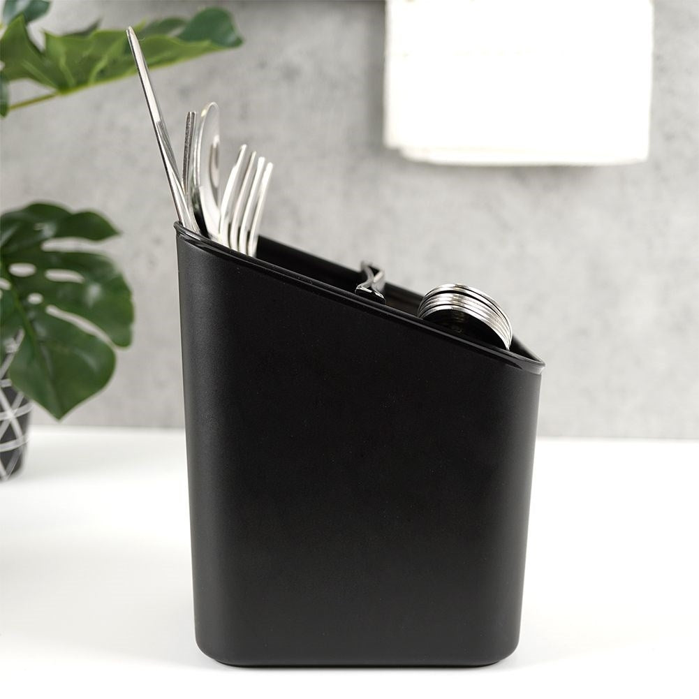 Black plastic container with two compartments for cutlery storage