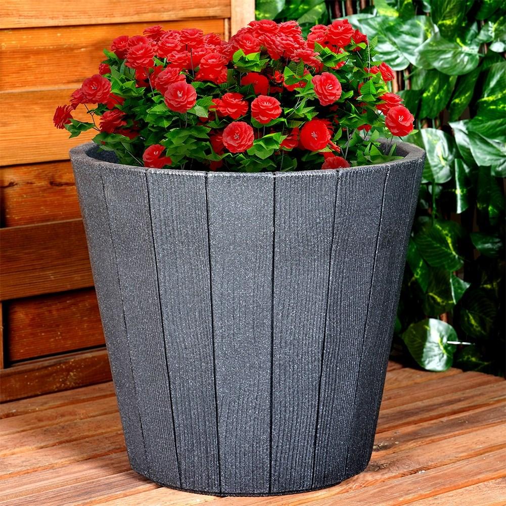Black plastic flower pot with wooden texture, weatherproof for outdoors.