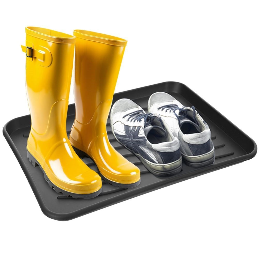 Black plastic shoe holder - protects the floor from dirt and water