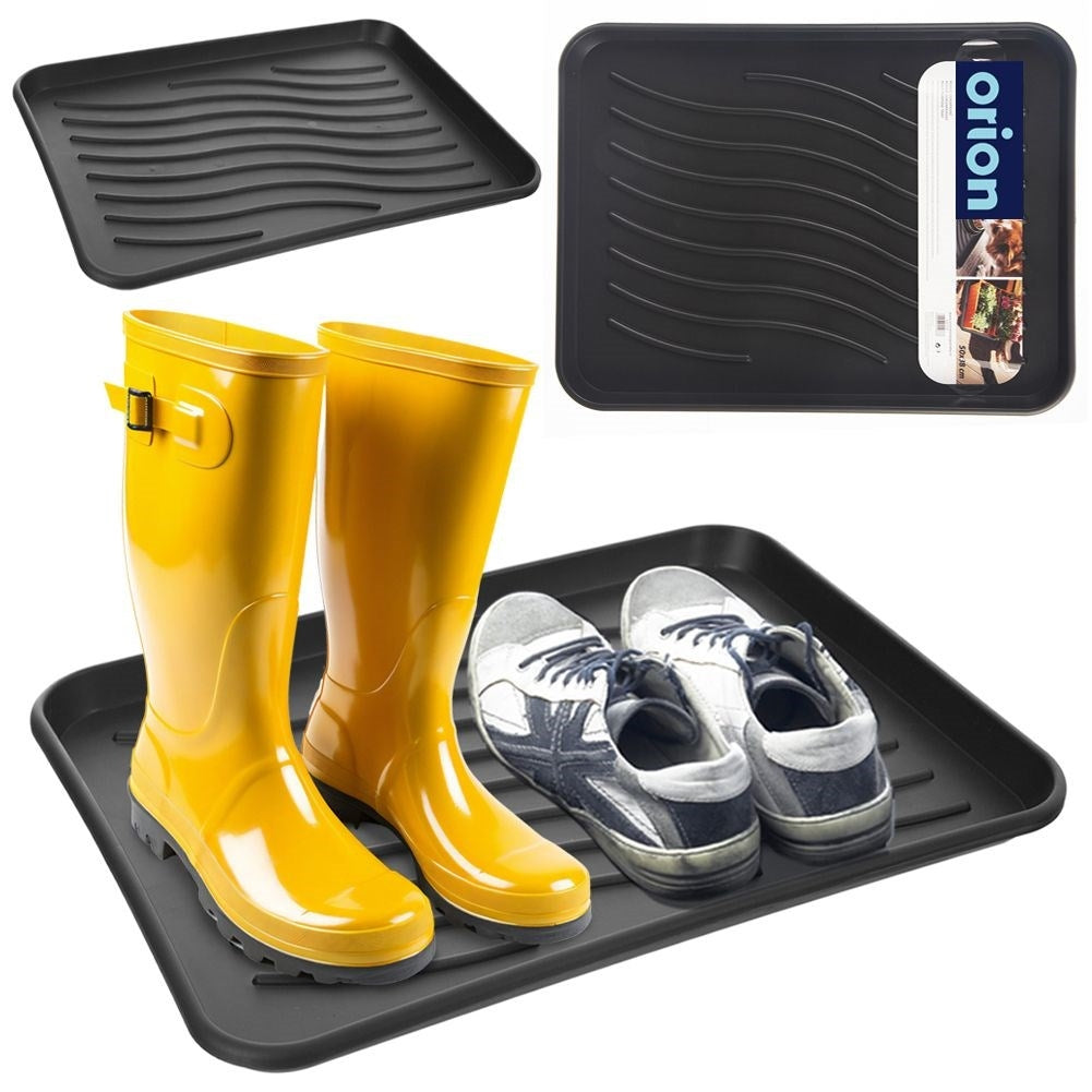 Black plastic shoe holder - protects the floor from dirt and water