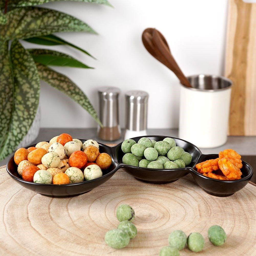 Black porcelain bowl with three compartments for snacks and dipping sauces