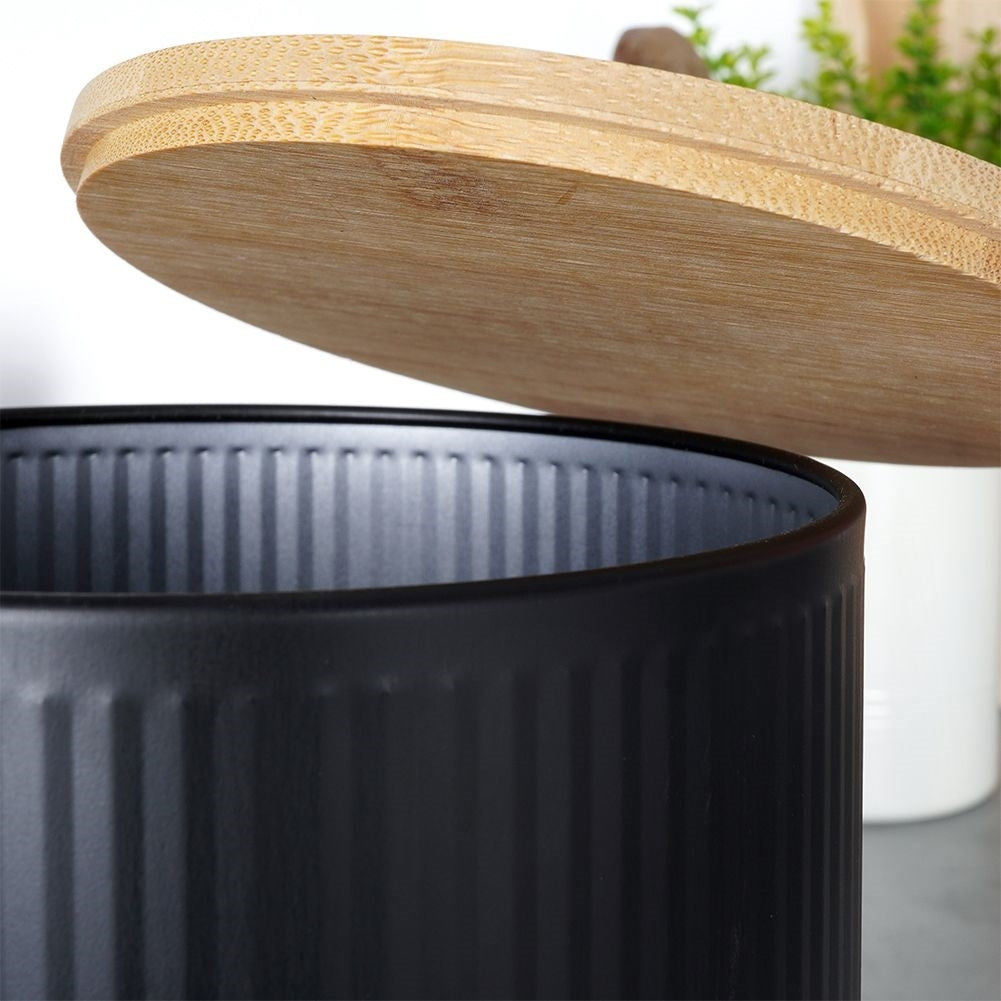 Black storage jar with bamboo lid for food