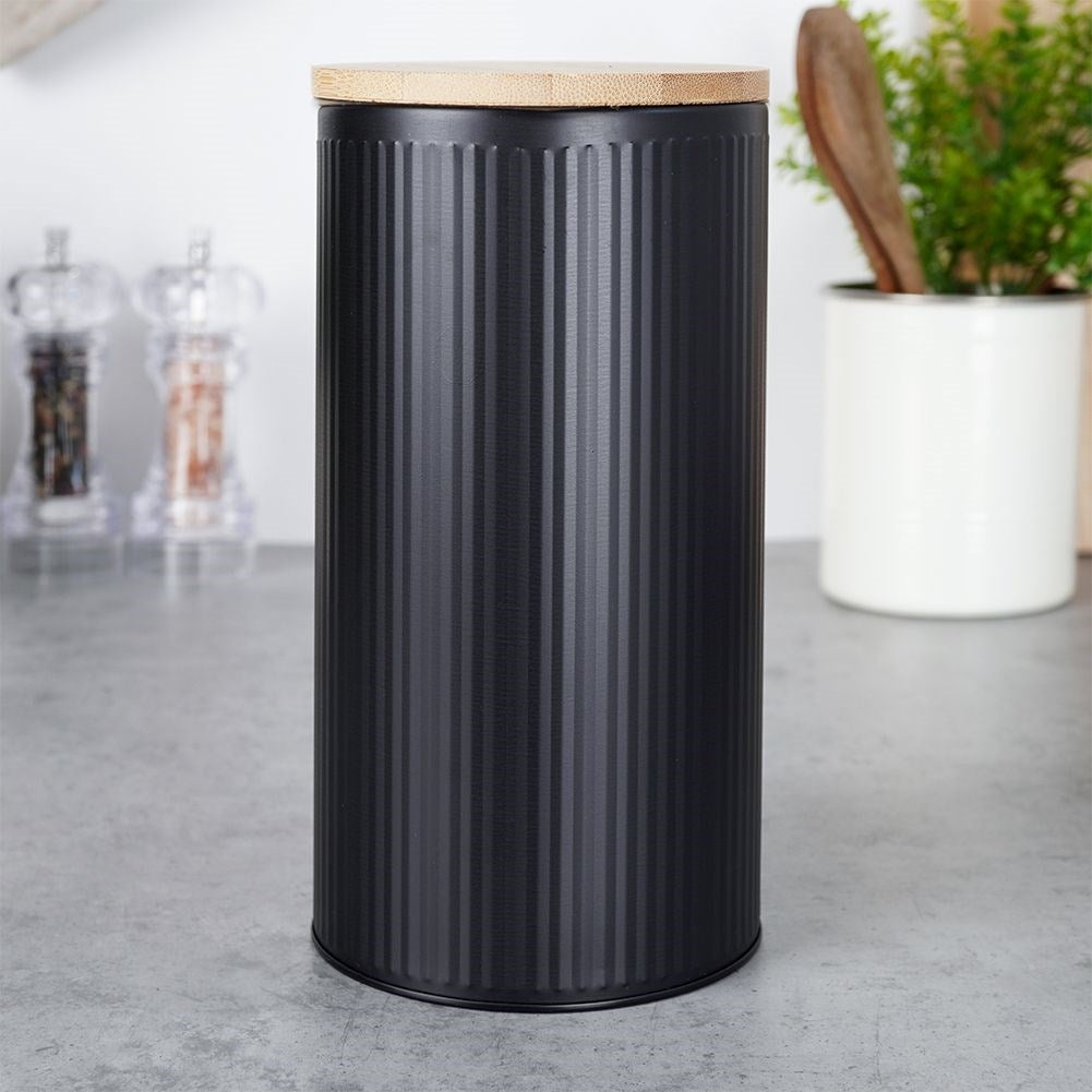Black storage jar with bamboo lid for food