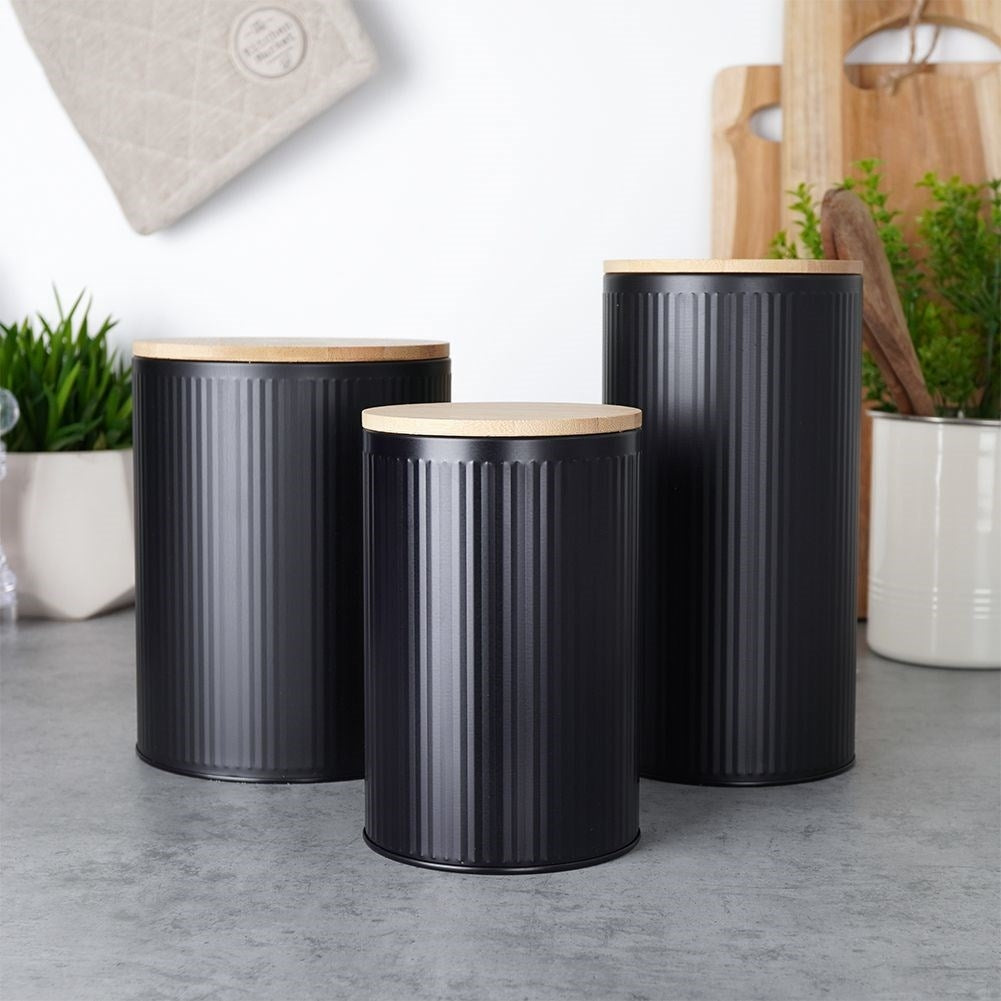 Black storage jar with bamboo lid for food