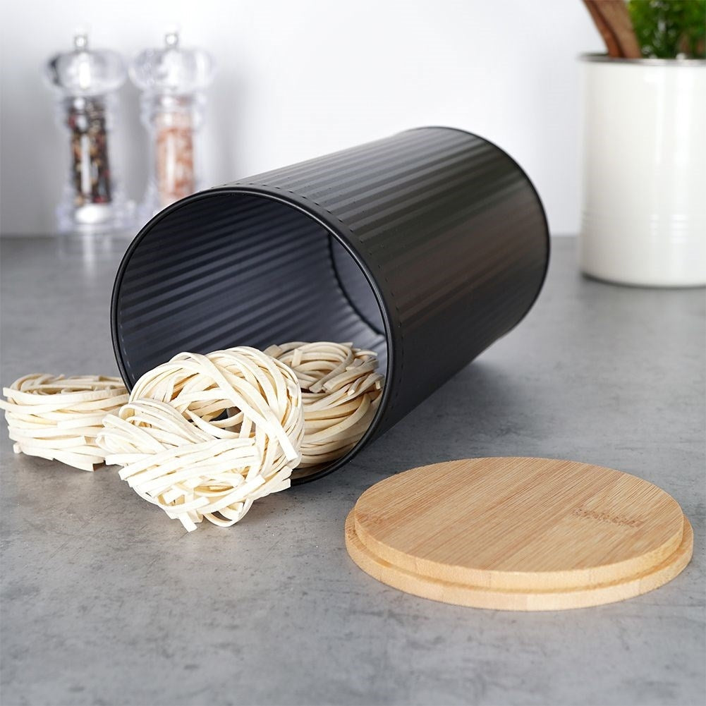Black storage jar with bamboo lid for food