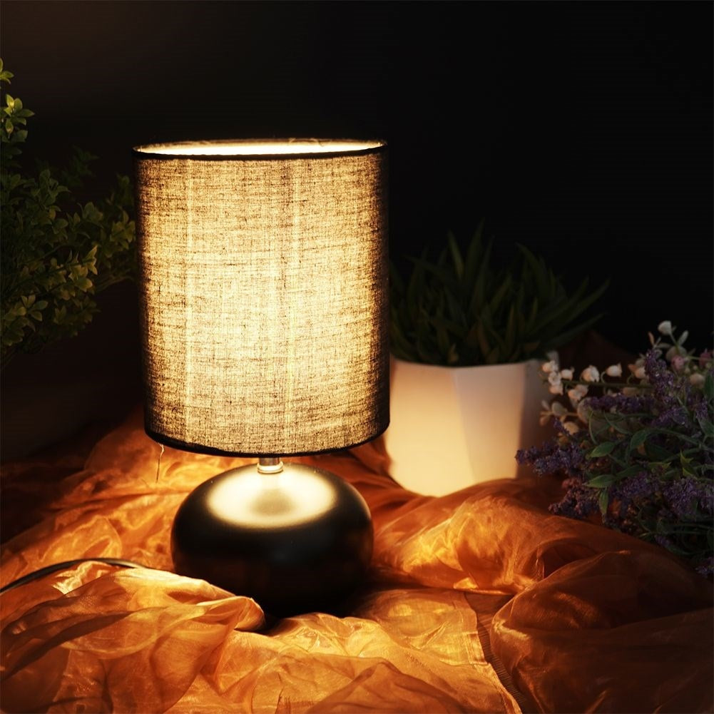 Black table lamp with metal base for home, office, study