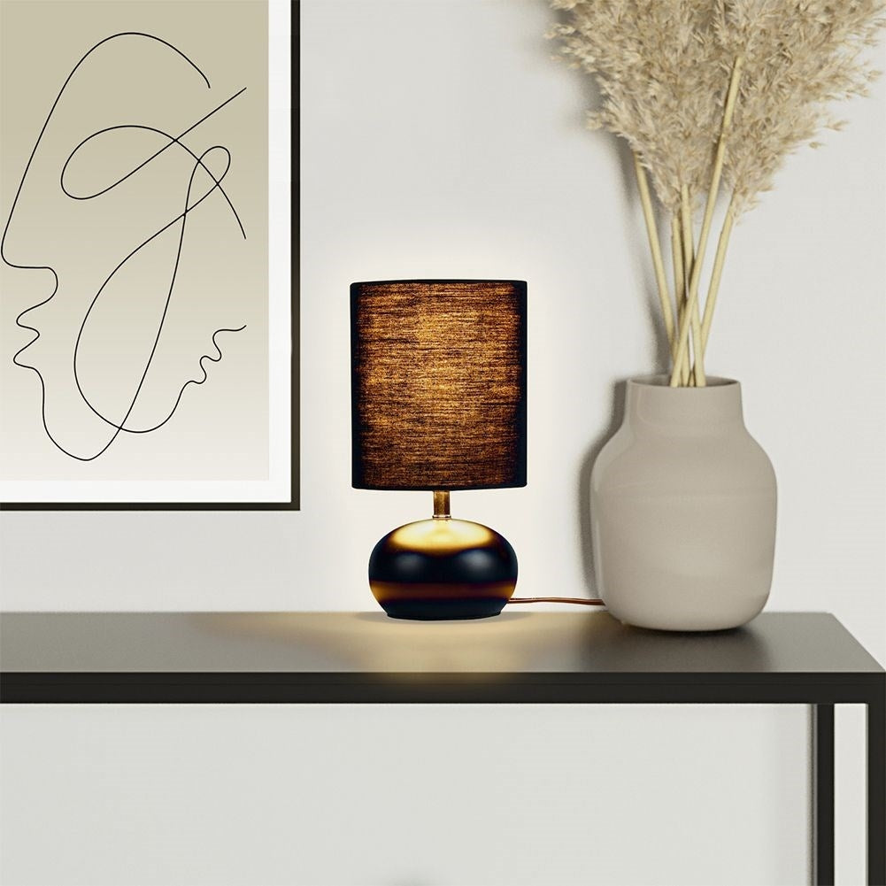Black table lamp with metal base for home, office, study