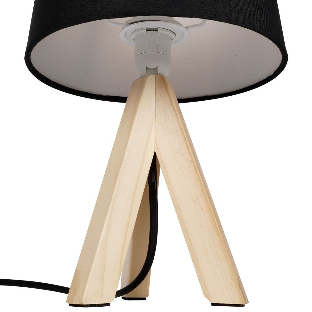 Black table lamp with shade and wooden legs for home and office