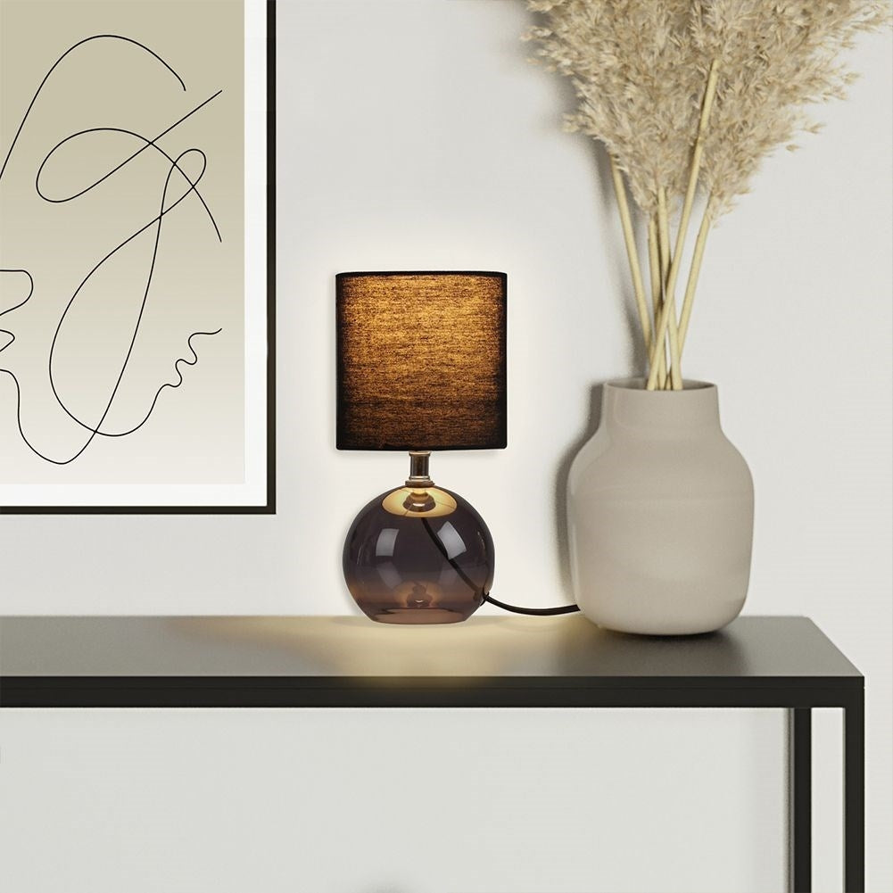 Black table lamp with smoky glass effect for home and office