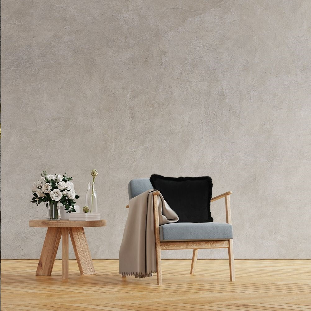 Black velvet cushion with fur, soft and elegant decoration