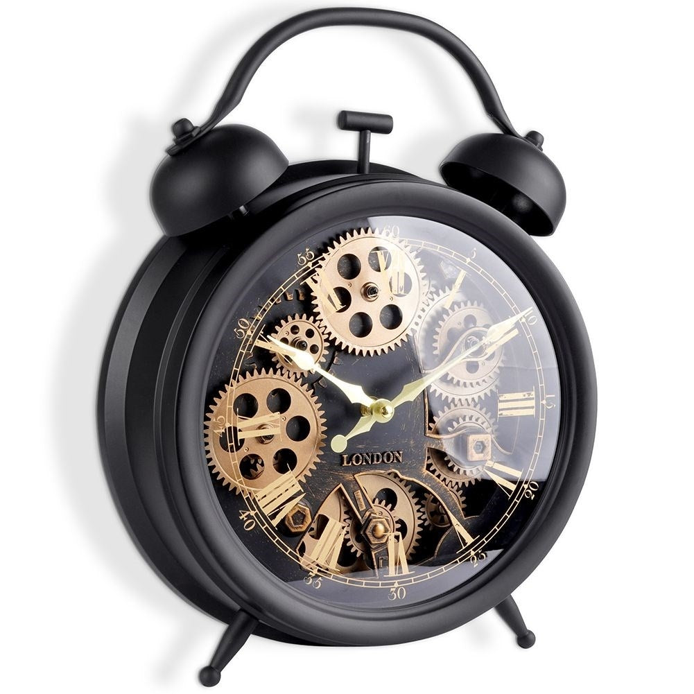 Black wall clock with moving gold gears and Roman numerals