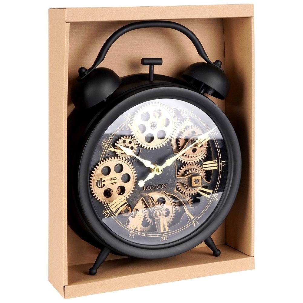 Black wall clock with moving gold gears and Roman numerals