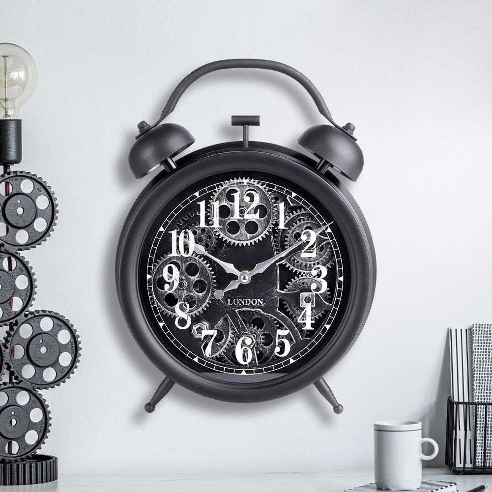 Black wall clock with moving silver gears and clear numbers
