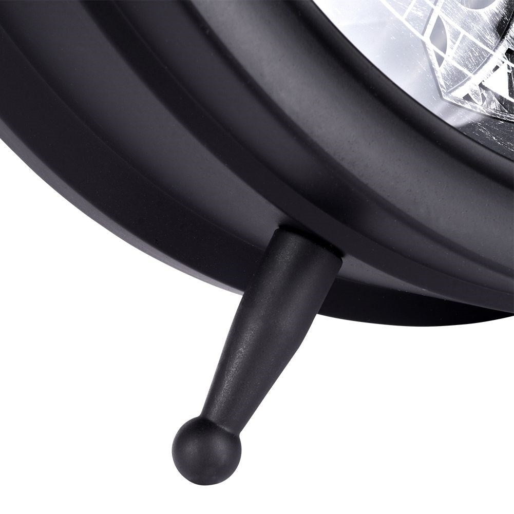 Black wall clock with moving silver gears and clear numbers