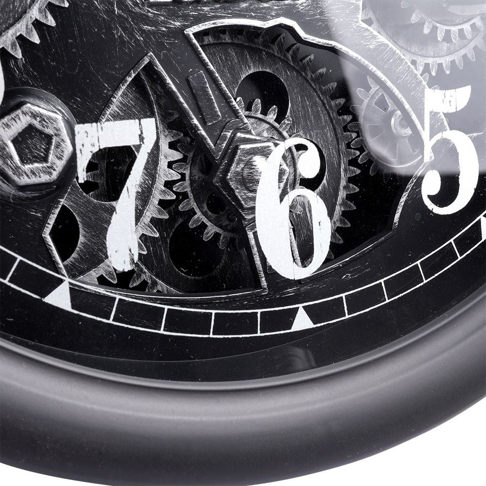 Black wall clock with moving silver gears and clear numbers