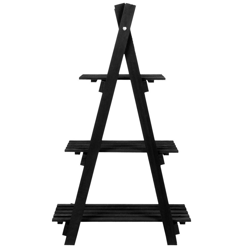 Black wooden flower stand with three levels in an industrial style