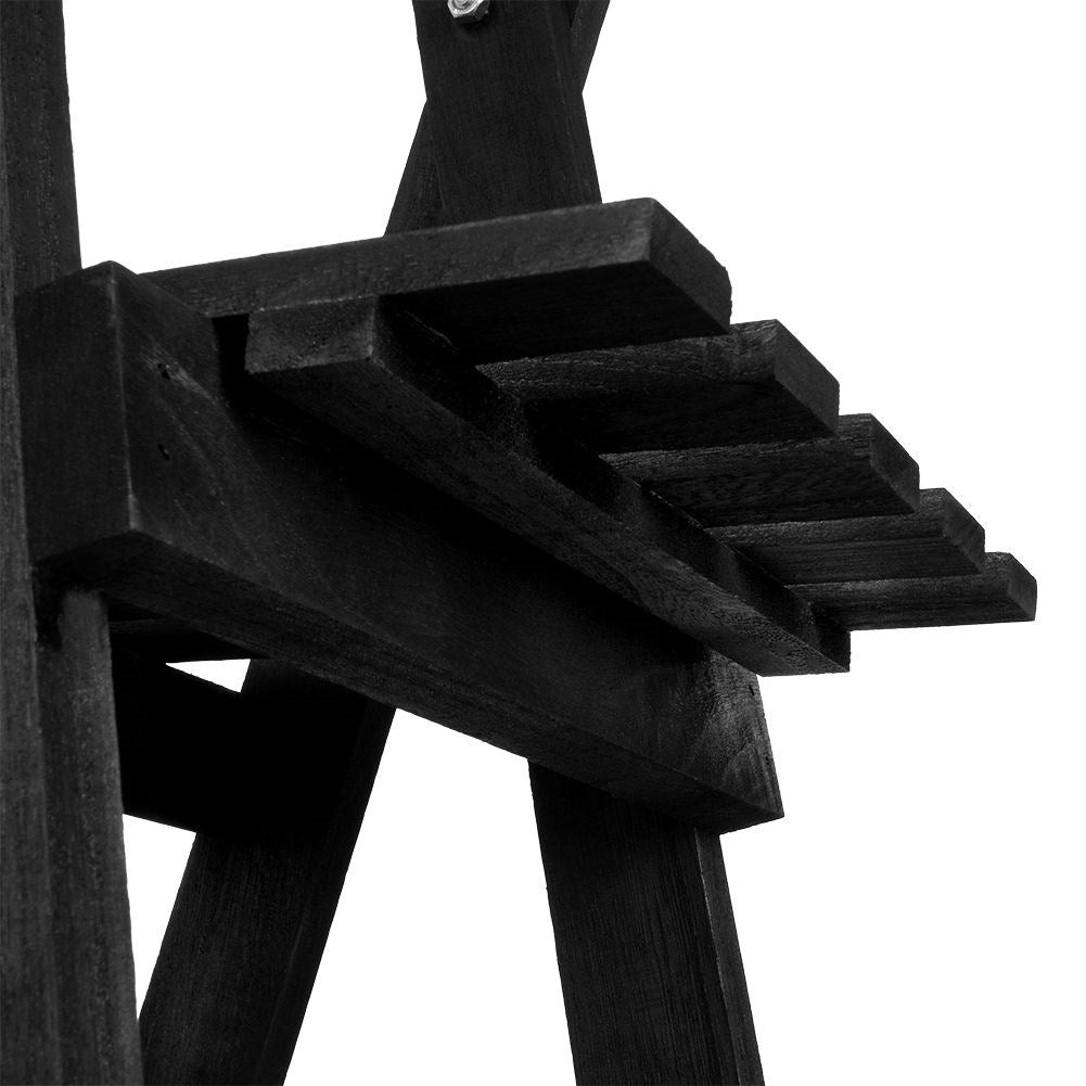Black wooden flower stand with three levels in an industrial style