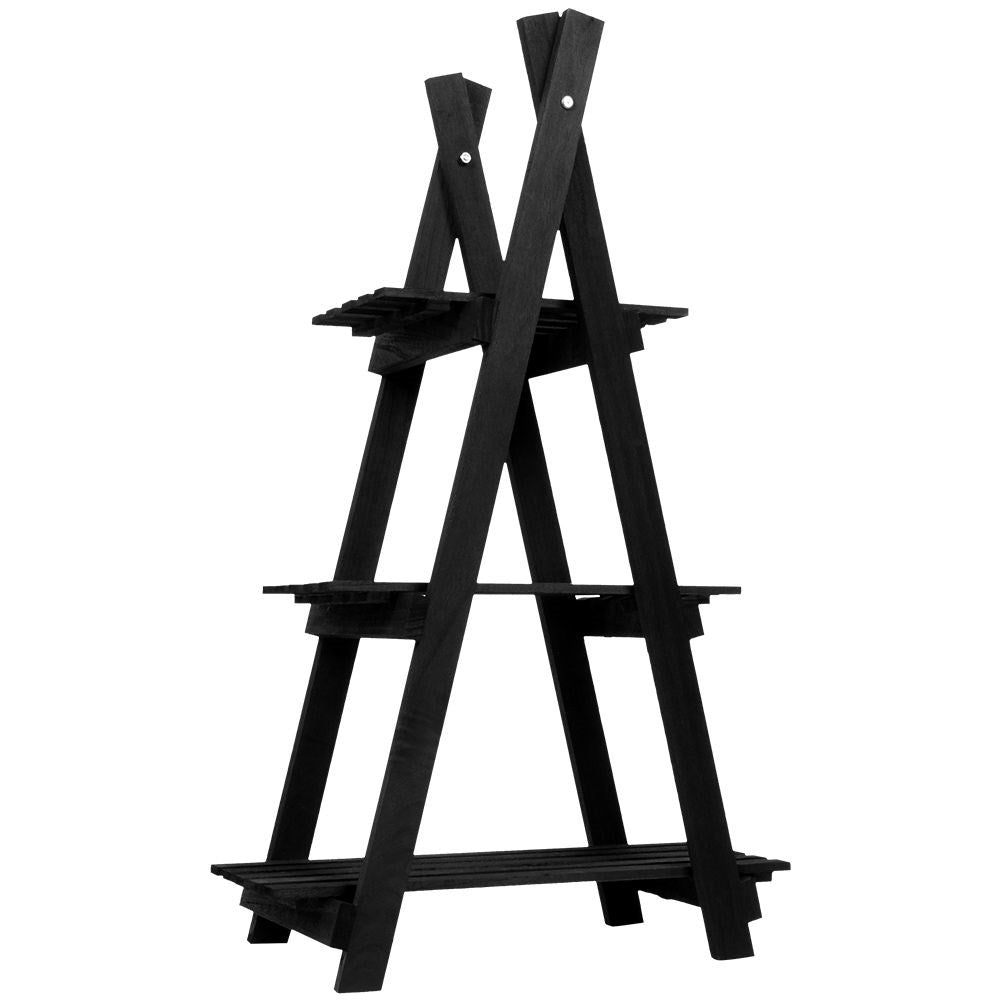 Black wooden flower stand with three levels in an industrial style