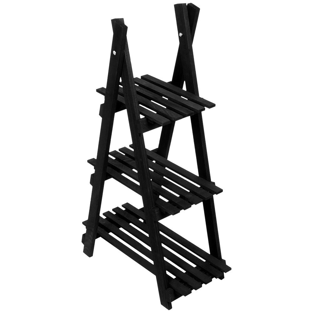 Black wooden flower stand with three levels in an industrial style