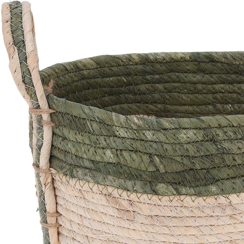 Boho plant pot in woven seagrass basket with handle