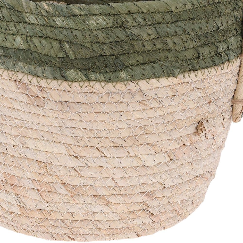 Boho plant pot in woven seagrass basket with handle