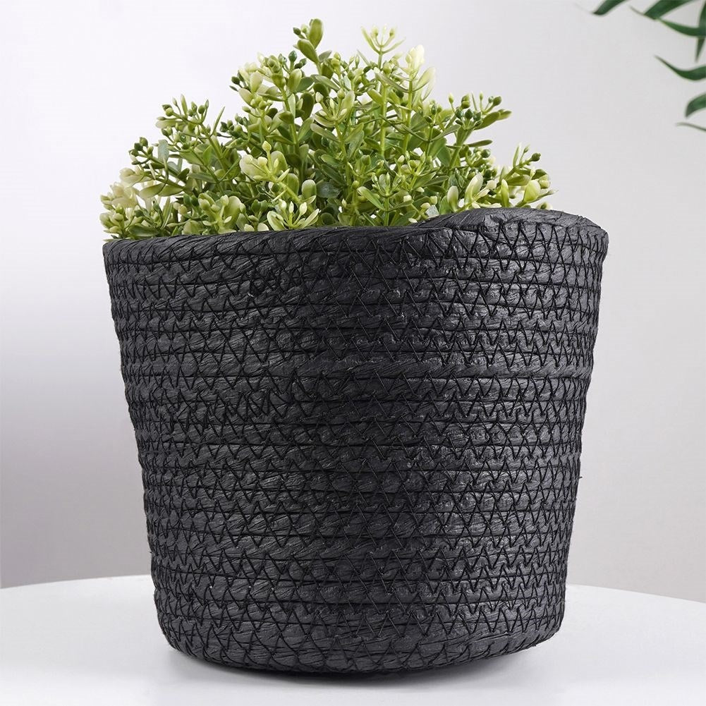 Boho-style black bin for pots and small things