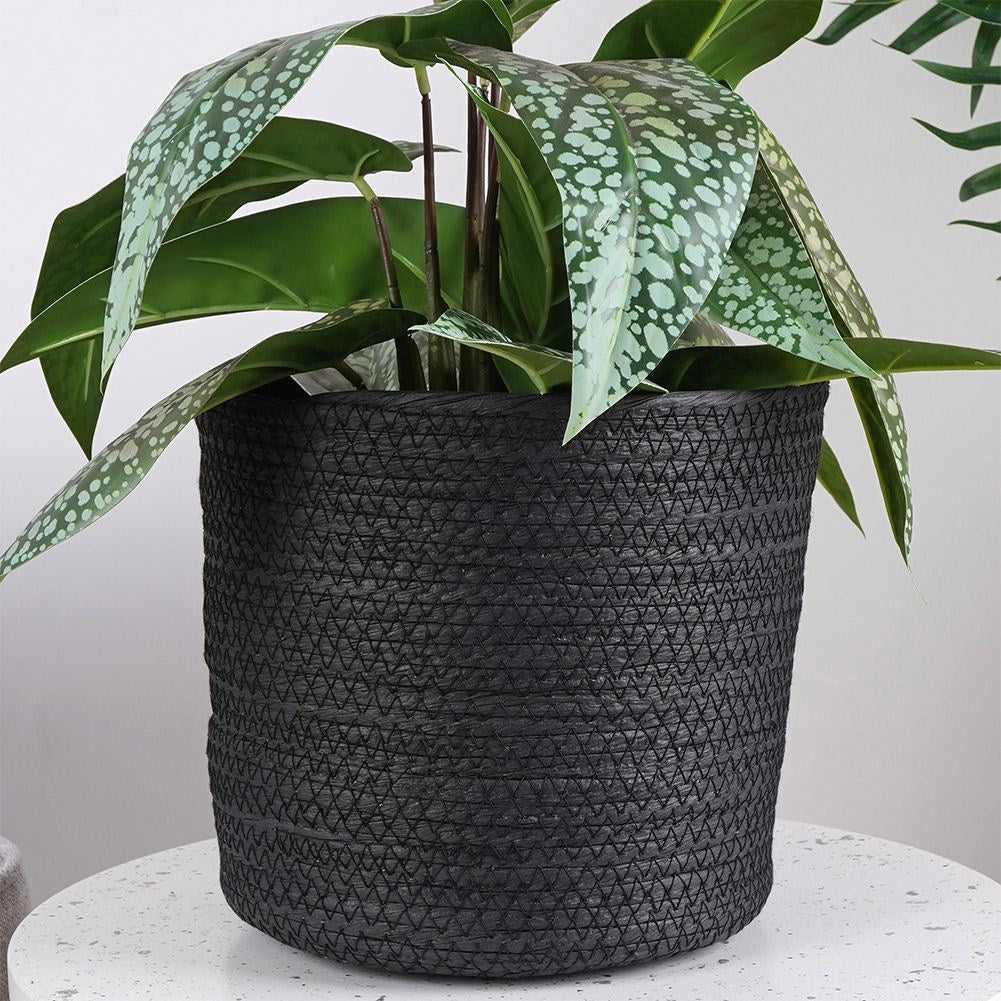 Boho style black bin for storage and pot cover