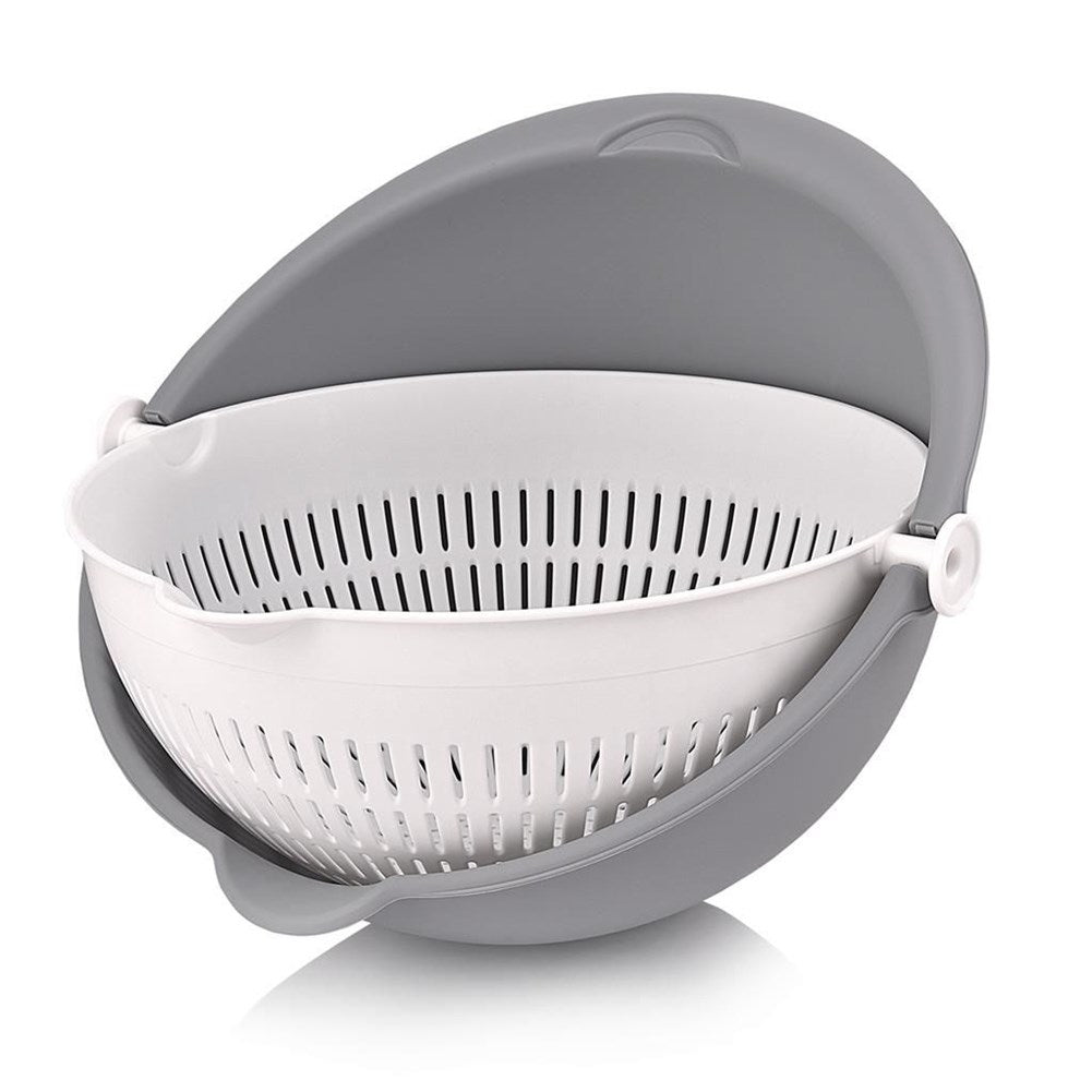 Bowl with rotating strainer for easy draining