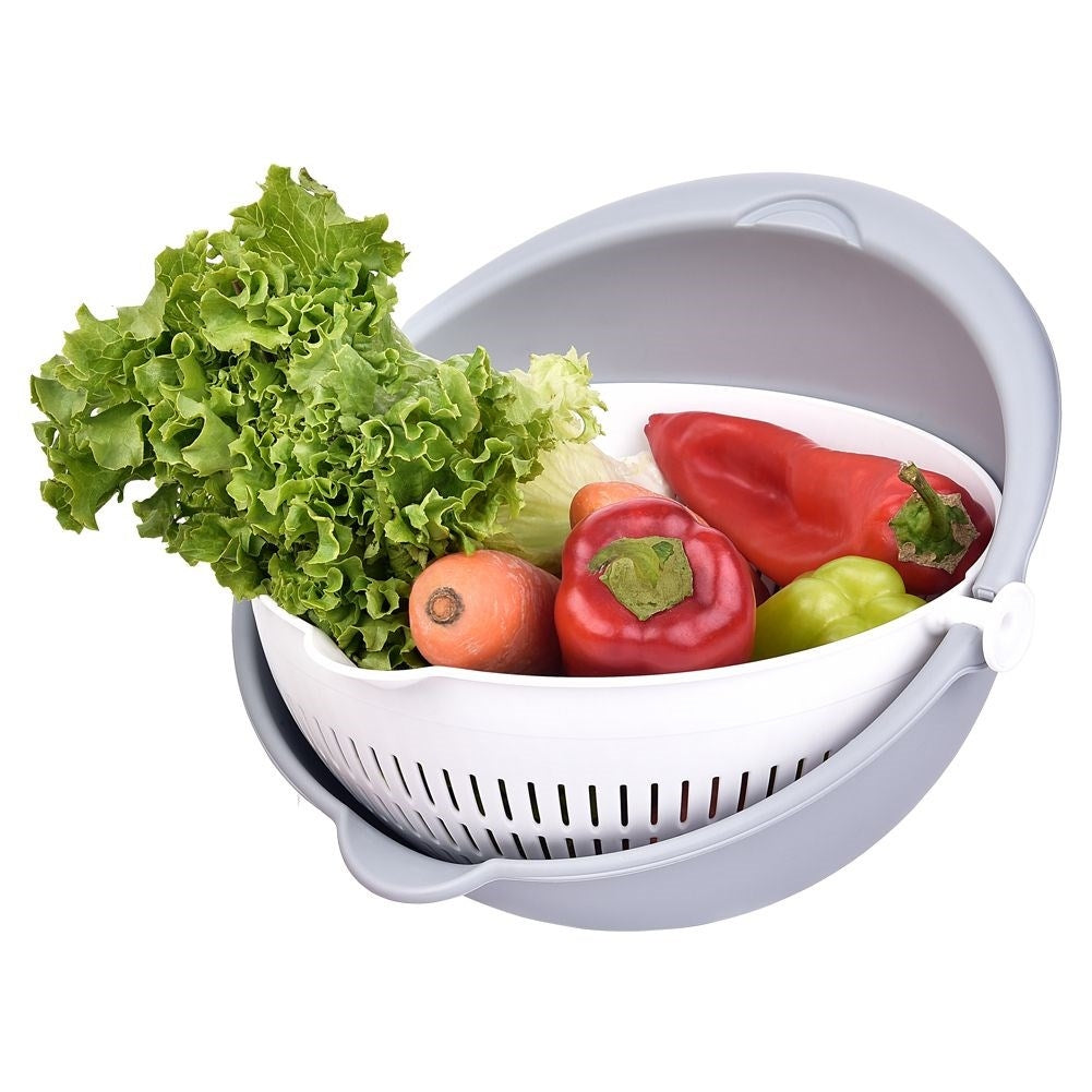 Bowl with rotating strainer for easy draining