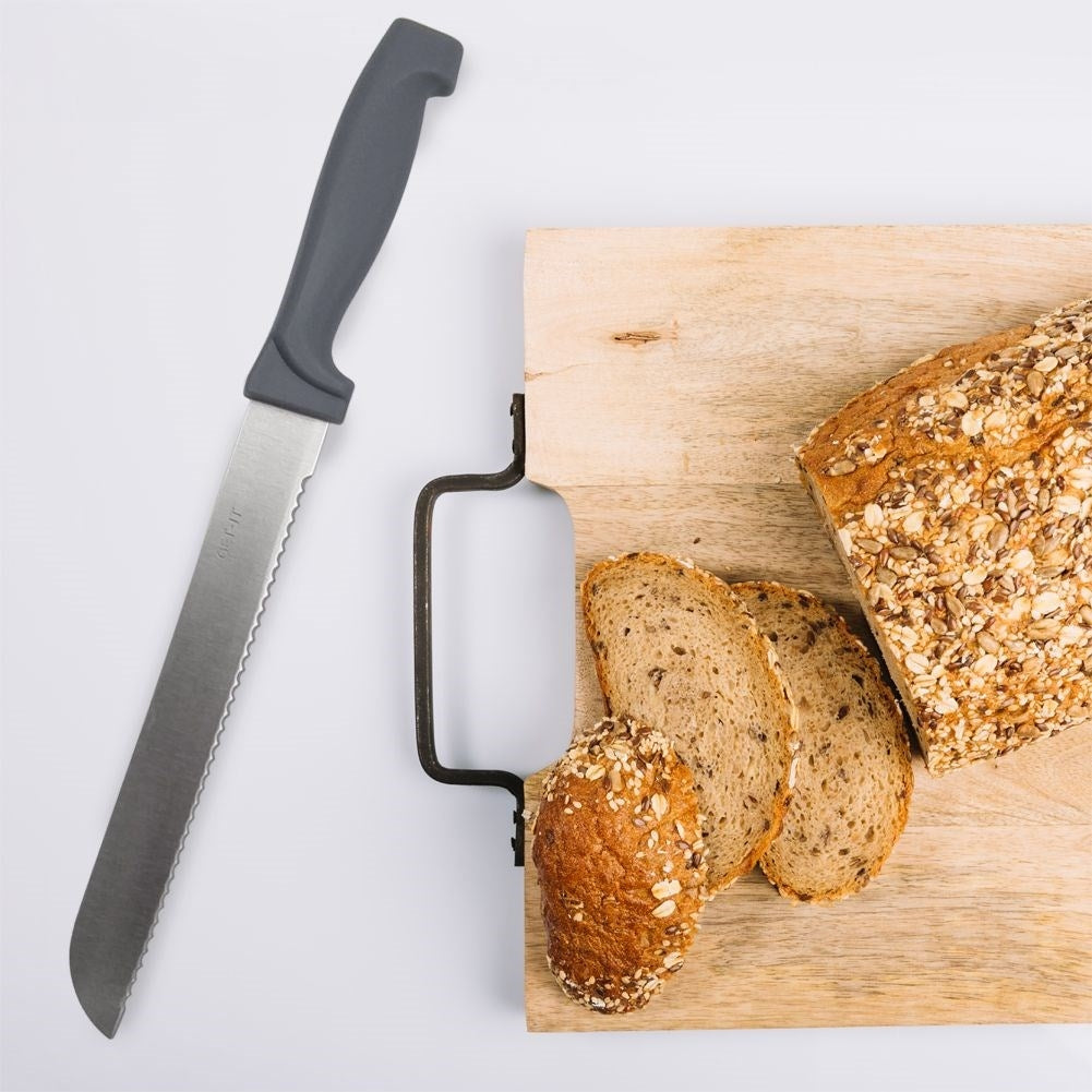 Bread knife with ergonomic handle and steel blade