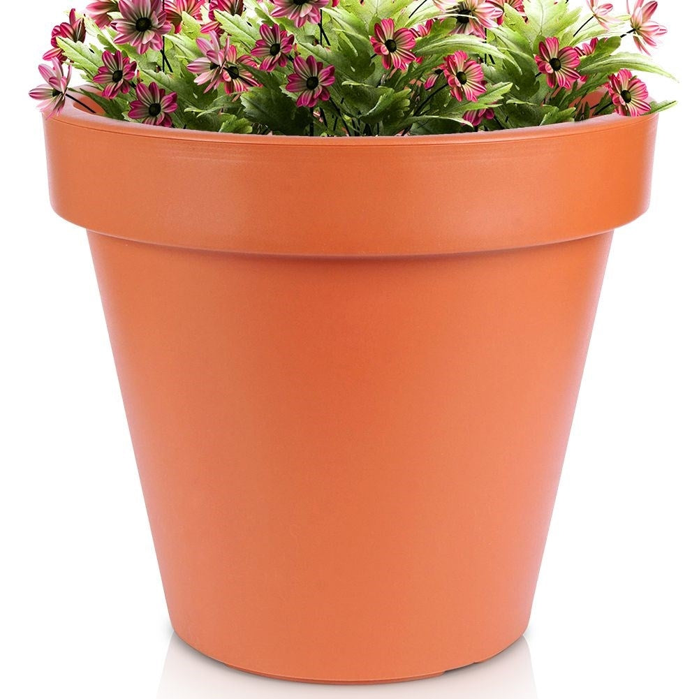Brick red flower pot in weatherproof plastic for the garden