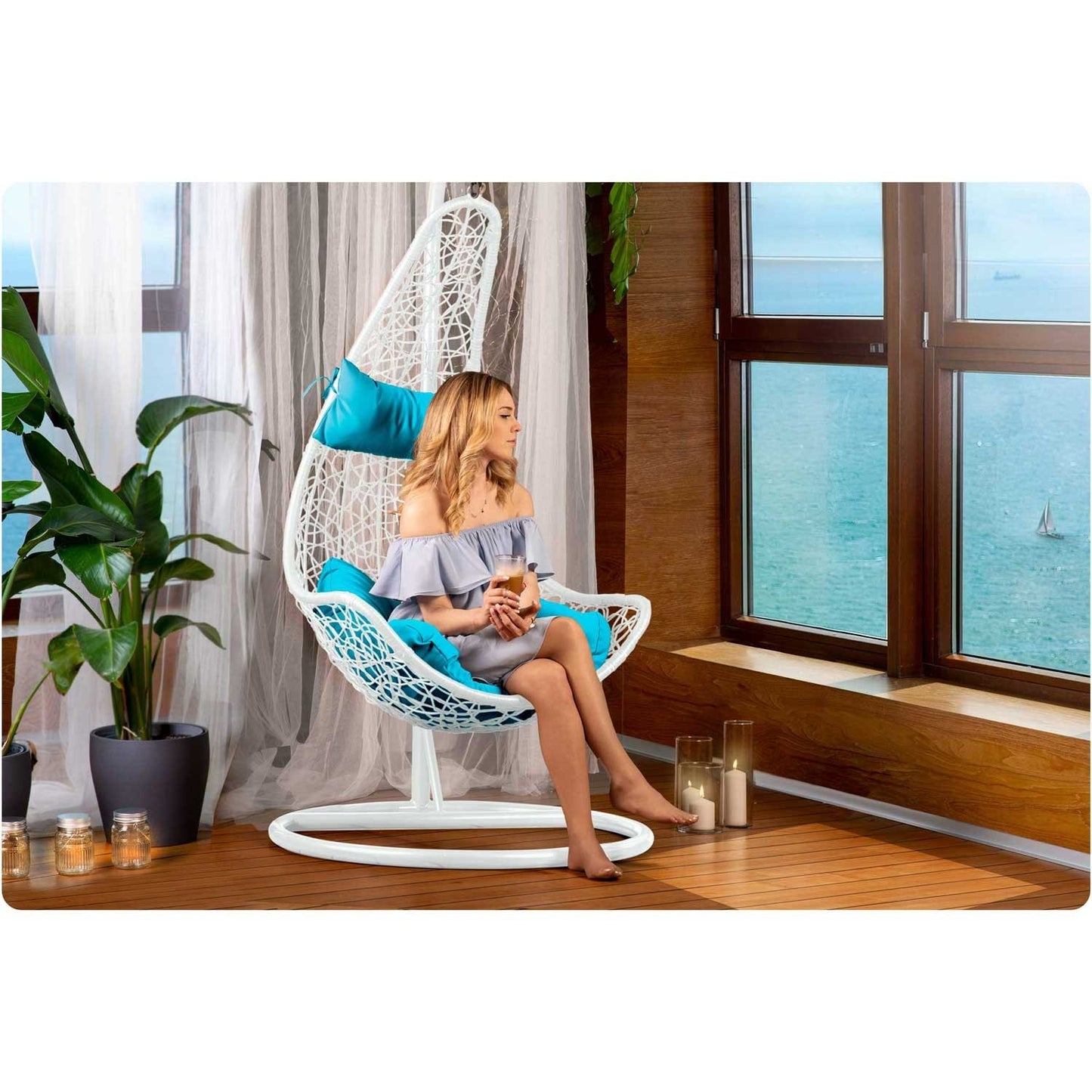 Cabana hanging rocking garden chair white + blue cushions