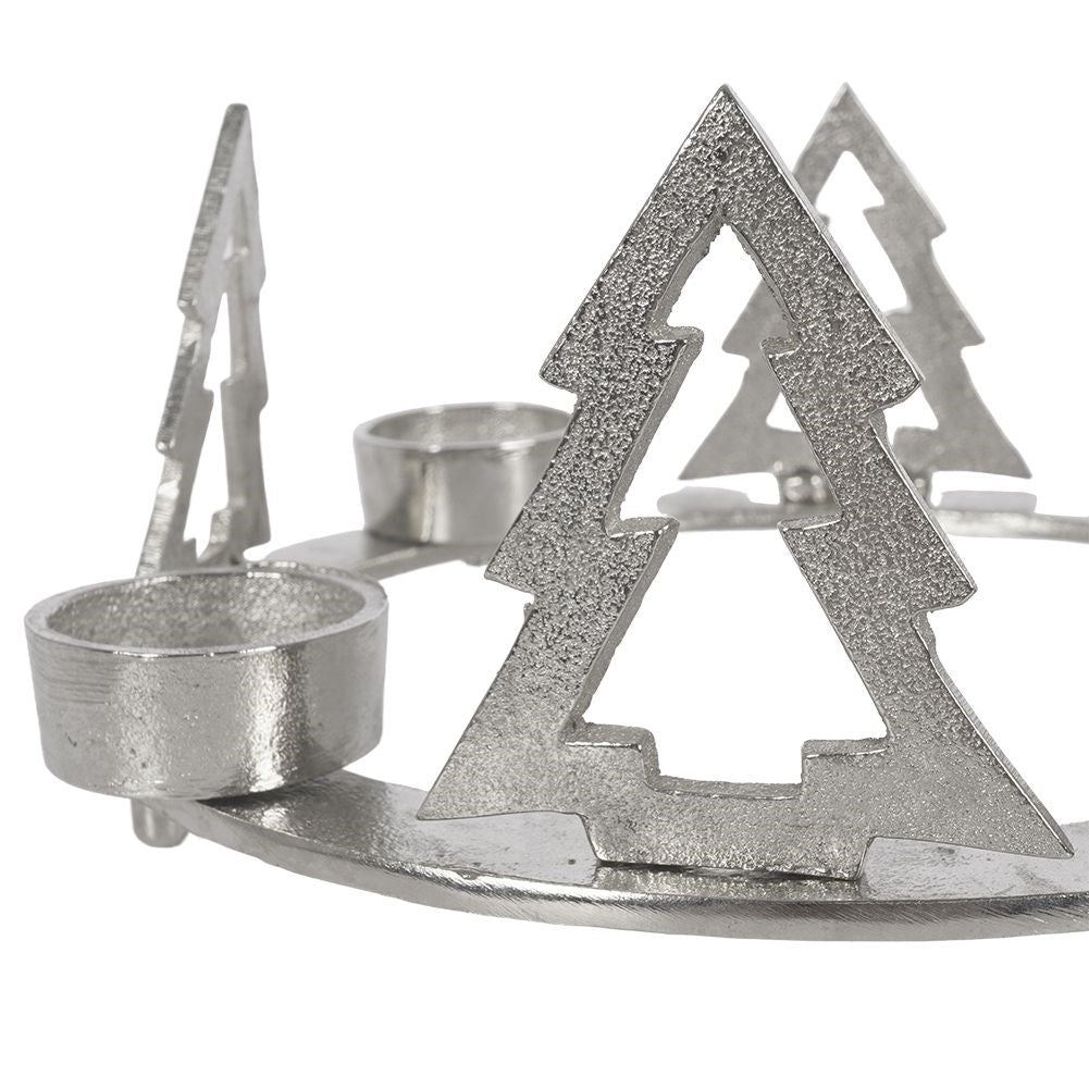 Candle holder for four candles with fir trees in silver aluminium