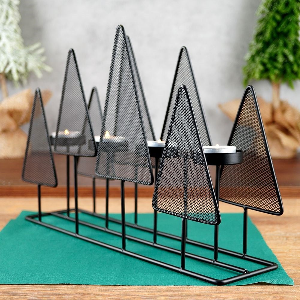 Candlestick for 4 tealights with Christmas trees in black metal