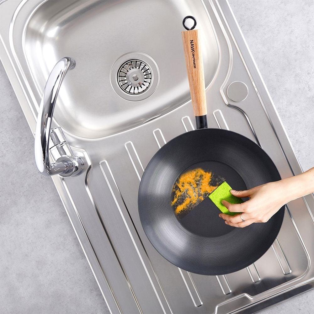 Carbon steel wok with non-stick coating