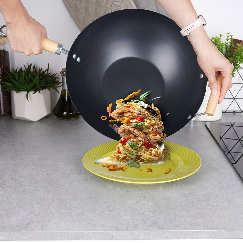 Carbon steel wok with non-stick coating