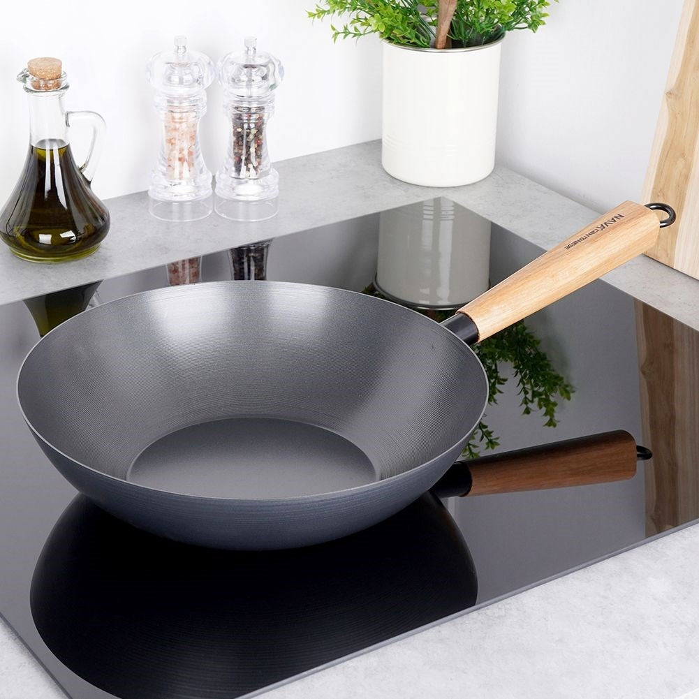 Carbon steel wok with non-stick coating