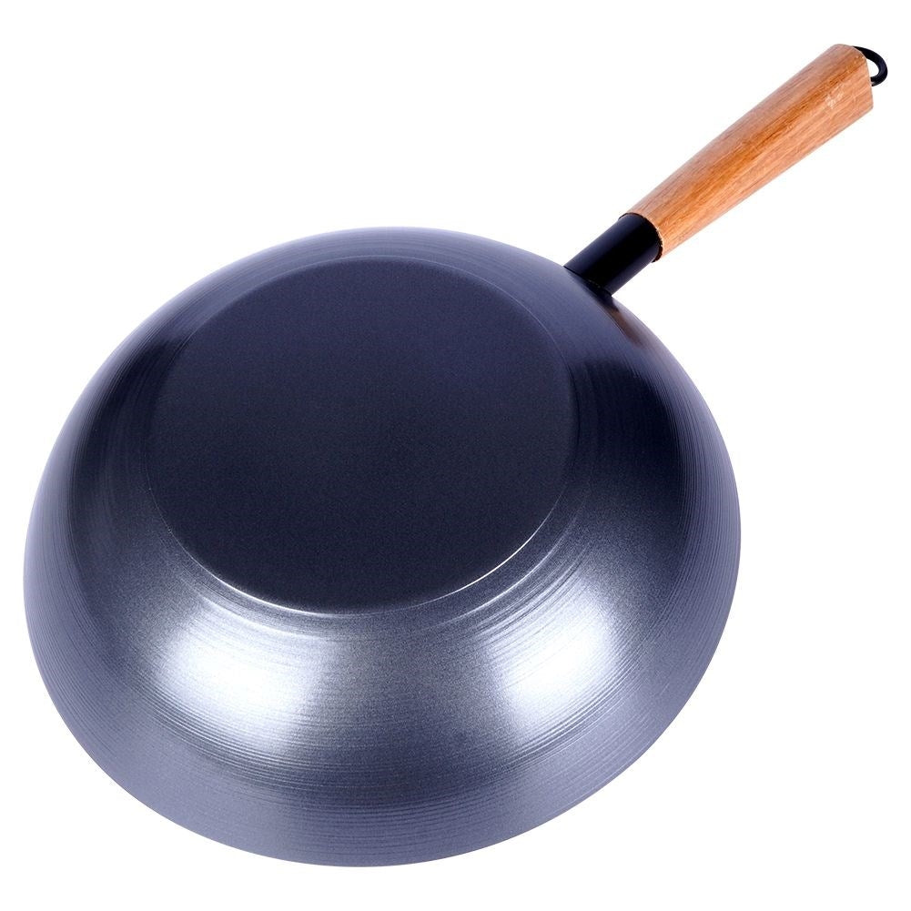 Carbon steel wok with non-stick coating