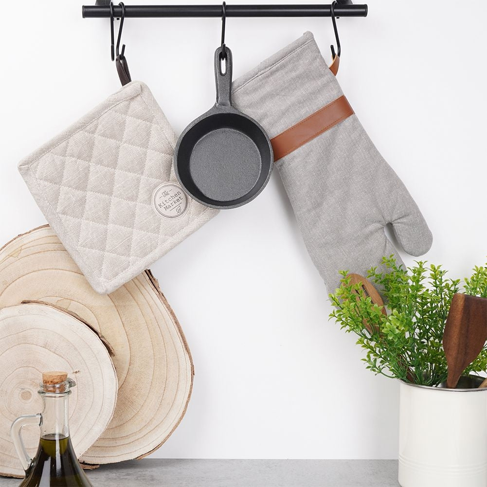 Cast iron dish with wooden tray for tapas and snacks