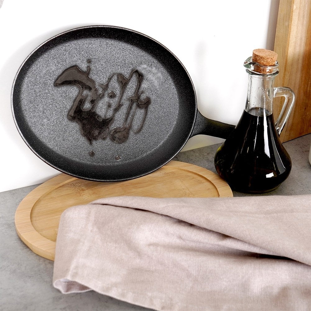 Cast iron pan for delicious dishes on the stove, oven or fire