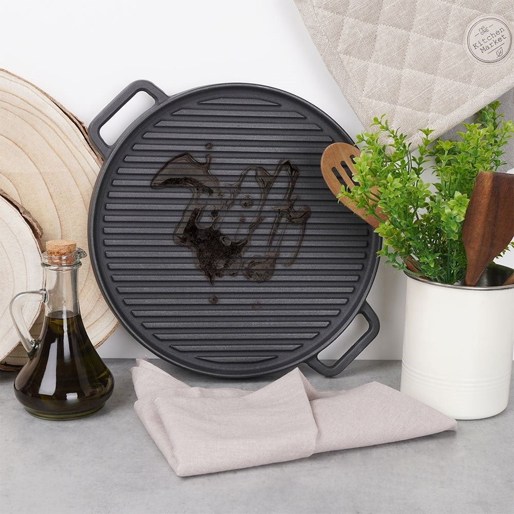 Cast iron pan for meat, vegetables and potatoes in oven or fire