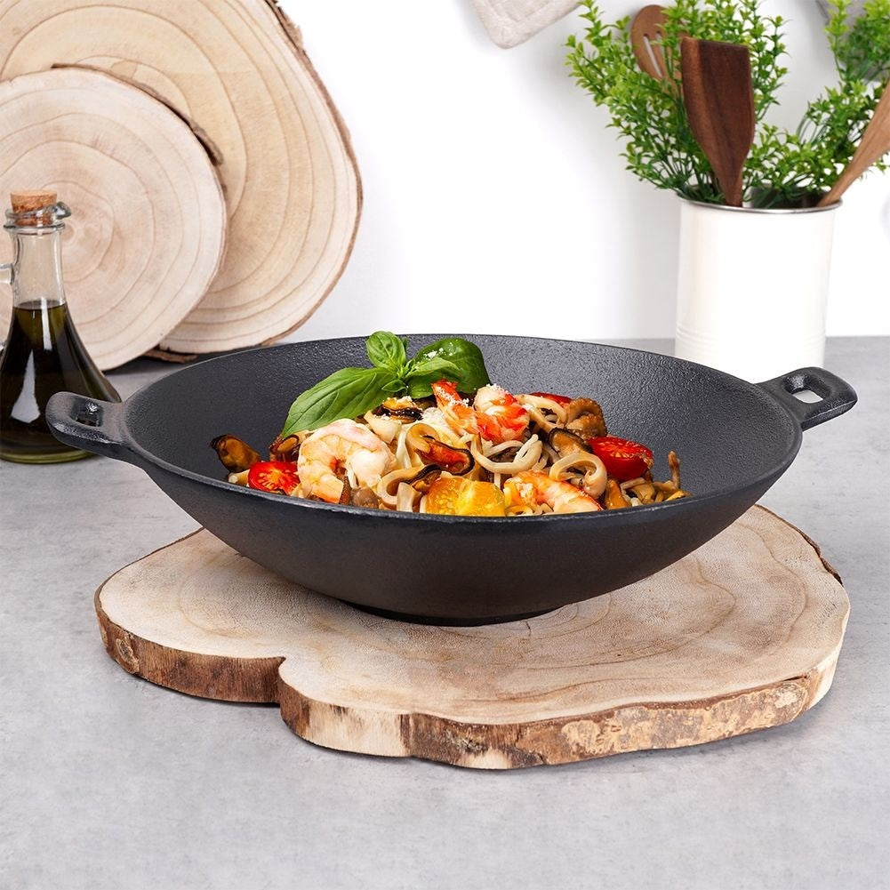Cast iron pan for meat, vegetables and potatoes in oven or fire
