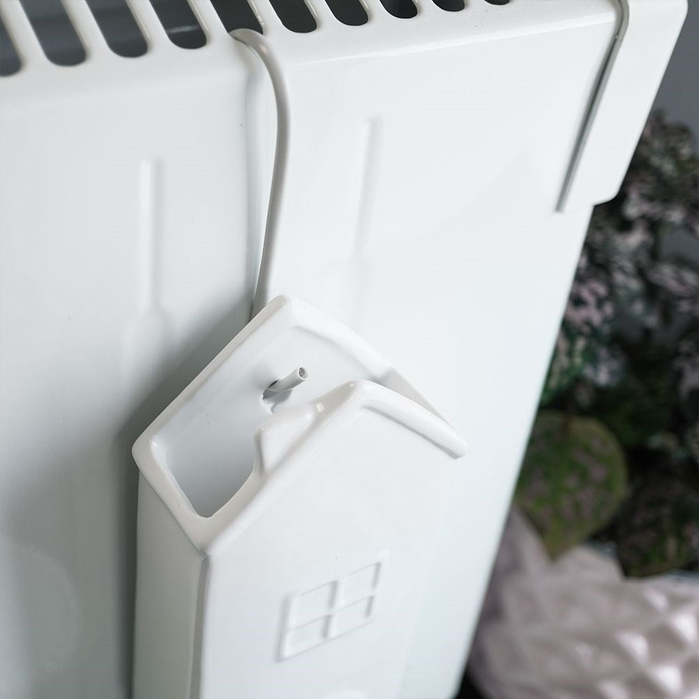 Ceramic Humidifier with House Motif for Dry Winter Days